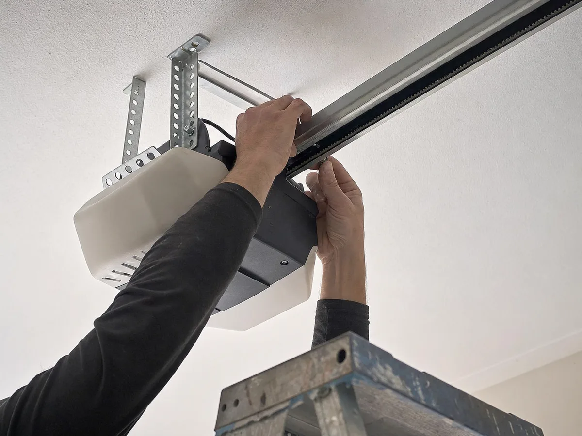 garage door repair technician on the job in Los Angeles, CA